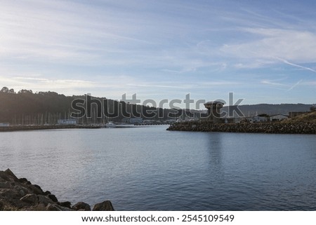 Similar – Image, Stock Photo An imposing landscape of rugged mountains and fields that extend to the horizon