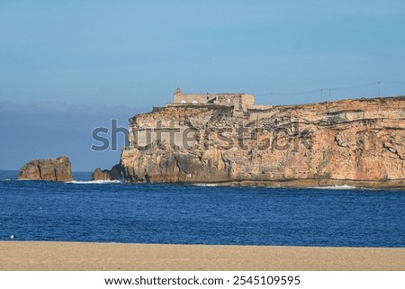 Similar – Image, Stock Photo An imposing landscape of rugged mountains and fields that extend to the horizon