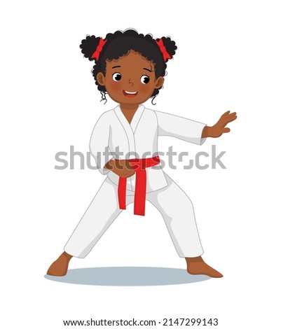 cute little karate kid African girl with black belt showing hand defense techniques poses in martial art training practice