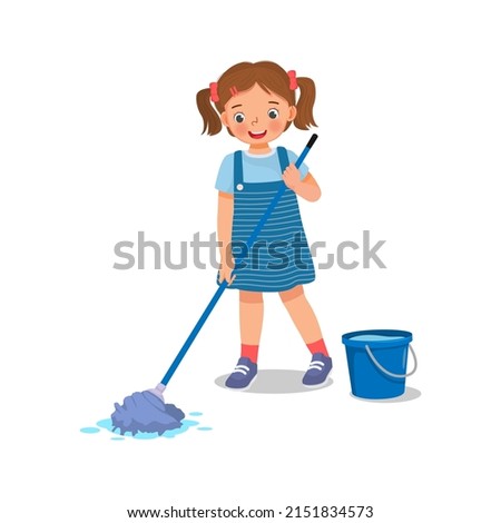 cute little girl mopping the floor with mop and bucket doing housework chore at home