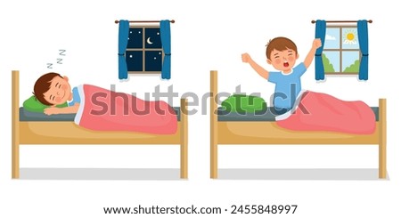 Cute little boy sleeping in the bed at night and wake up in the morning