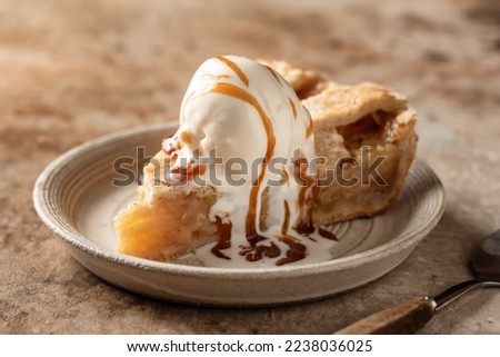 Similar – Image, Stock Photo Apple pie with ice cream and cup of coffee. Top view of apple tart slice