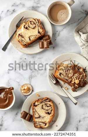 Similar – Foto Bild Drei Sauerteigbrötchen flachgelegt mit Mohn und Sesam auf einer Serviette auf einem Holzhocker