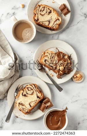 Similar – Foto Bild Drei Sauerteigbrötchen flachgelegt mit Mohn und Sesam auf einer Serviette auf einem Holzhocker