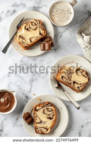 Similar – Foto Bild Drei Sauerteigbrötchen flachgelegt mit Mohn und Sesam auf einer Serviette auf einem Holzhocker