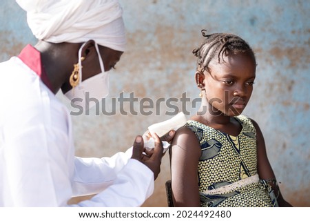 Similar – Image, Stock Photo Serious vaccinated girl with band aid on arm