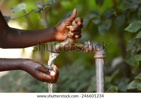 Drinking Water from a Tap - Water Scarsity Symbol