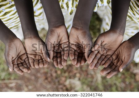 Hands Cupped Black African Children Begging Help Health Peace Education. African black children hold their hands cupped to beg for help, health, and peace for their continent.