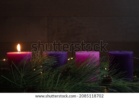 Similar – Image, Stock Photo advent wreath with burning red candles standing on wooden table in living room with candle arch in window