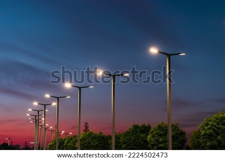 Similar – Foto Bild Straßenlampe und blauer Himmel auf der Straße