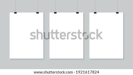 Blank posters hanging on a binder clips. A4 white paper sheet hangs on a rope with clips. Mock up banner for promotion and advertising. Vector illustration.