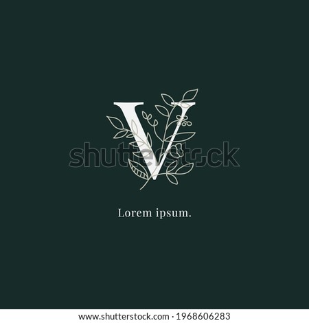 initial V letters monogram logo with leaf and flower vector.