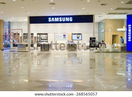SAMUT PRAKAN, THAILAND  - APRIL 5, 2015 People shop at Samsung mobile shop at Mega Bangna. It is a South Korean multinational conglomerate company.