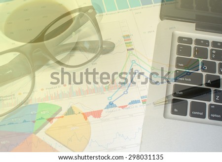 Financial papers, pen supplies closeup