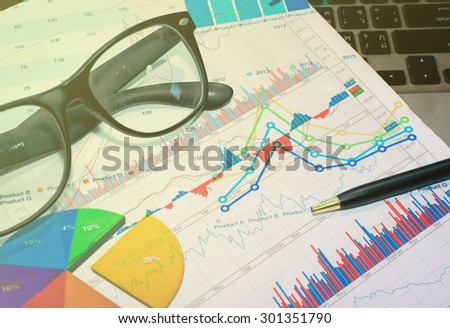Financial papers, pen supplies closeup.business concept