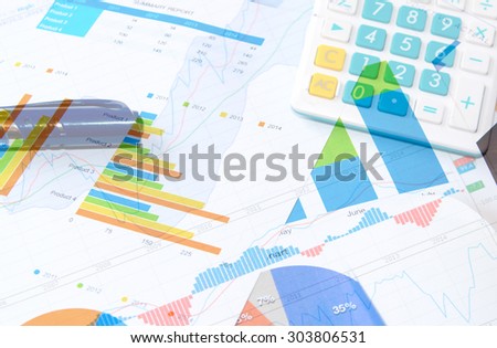 financial and business color charts and graphs on the table.business concept