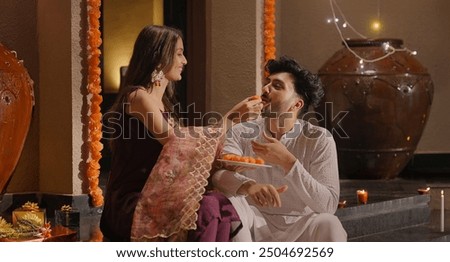 Similar – Image, Stock Photo Cute woman sitting outdoors while using a phone