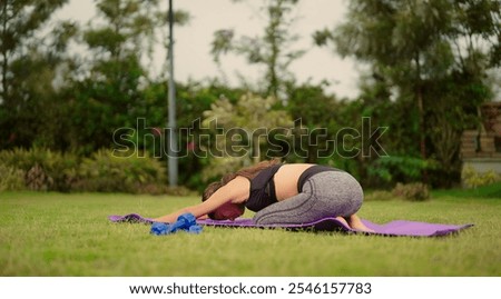 Similar – Image, Stock Photo Positive Asian sportswoman leaning on barbell in modern gym and looking at camera