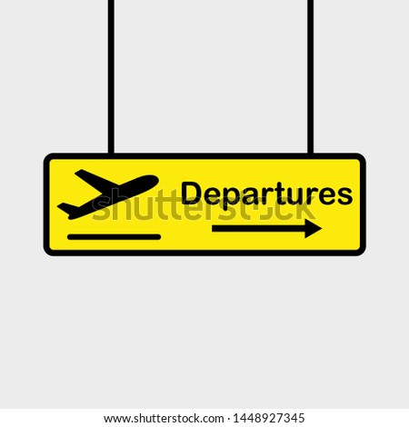 sign board at airport showing direction of departure zone