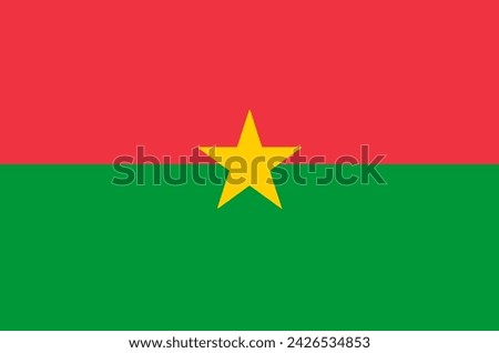 Close-up of red, green and yellow national flag of African country of Burkina Faso with yellow star. Illustration made February 17th, 2024, Zurich, Switzerland.