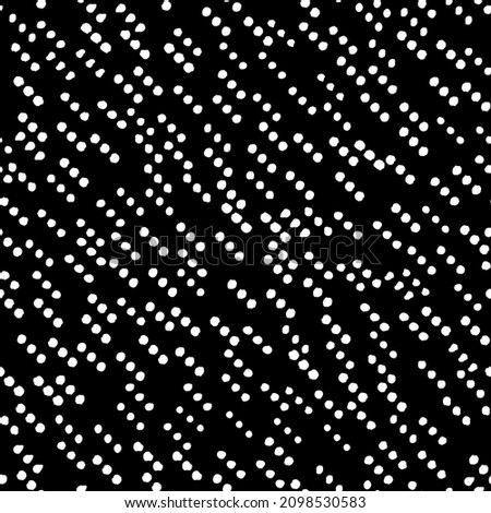 Diagonal rows of small dots seamless repeat pattern. Vector, irregular spots all over surface print in black and white.