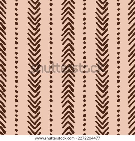 Abstract bohemian seamless repeat pattern. Vertical, hand drawn, vector arrows with dots all over surface print on beige background.