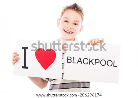 Boy with  sign I love Blackpool  . Series of boy with English city signs