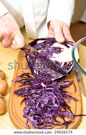 cutting up  red cabbage