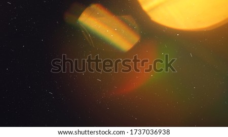 Rainbow Lens Optical Flare Film Dust Overlay Effect Vintage Abstract Bokeh Light Leaks Photo Retro Camera Defocused Blur Reflection Bright Sunlights. Use Screen Overlay Mode for Photo Processing.