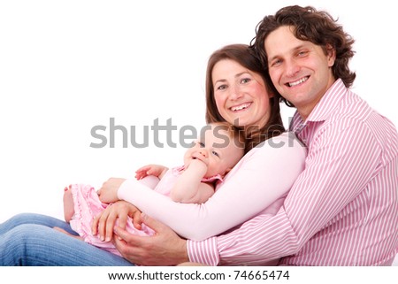 father mother and their baby girl sitting isolated on white background