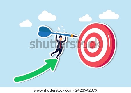 Successful business goal attainment is crucial for target achievement concept, businessman leader holding dart running from rising graph arrow and jump to bullseye target to win in business strategy