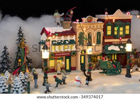 miniature christmas village scene with houses trees people dogs and cats celebrating the - Miniature Christmas Town Decorations miniature christmas village scene with houses trees people dogs and cats celebrating the - Miniature Christmas Town Decorations
