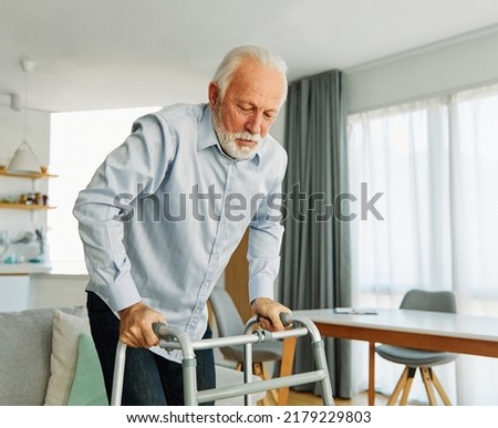 Similar – Image, Stock Photo Senior man using medical device to measure blood pressure