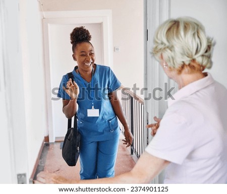 Similar – Image, Stock Photo Home caregiver helping senior woman with medication