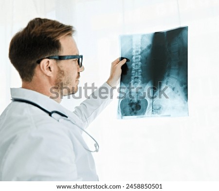 Similar – Image, Stock Photo Young doctor with x-ray film document on wall