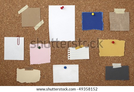 collection of various note papers  on cork board
