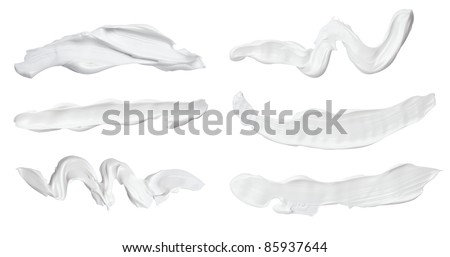collection of various beauty cream strokes on white background. each one is shot separately