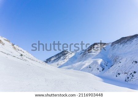 Picture of Nuria Valley mountains covered in snow at Catalan Pyrenees Stock foto © 