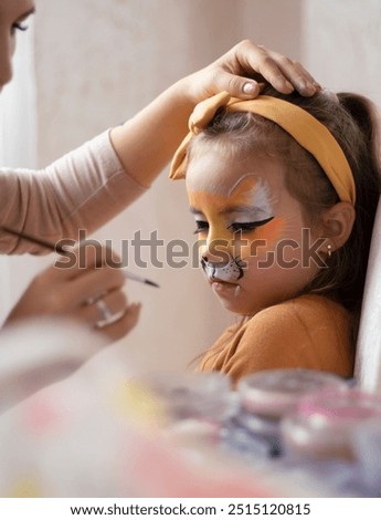 Similar – Image, Stock Photo Makeup artist painting face of calm woman