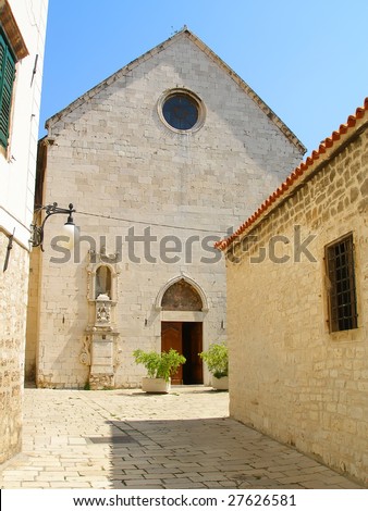The Mediterranean house with a round window and a flowerpot, Croatia (see more travel photo in my folio)