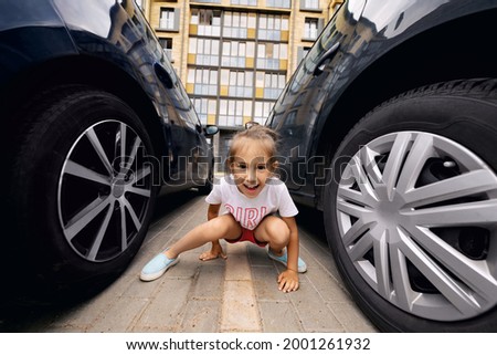 Similar – Image, Stock Photo Child happy between two dogs