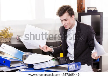 Business man have so many paperwork in the office
