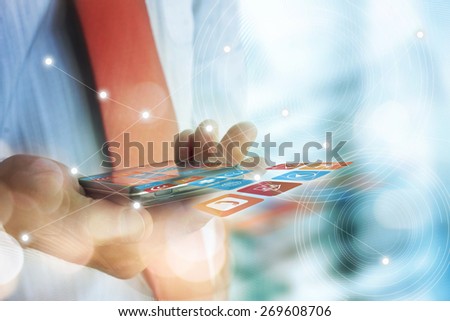 Close up of people hand using mobile phone