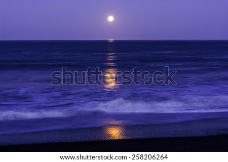 Full Moon setting on Moonstone Beach, along the Big Sur Highway, on the California Central Coast, near Cambria CA.