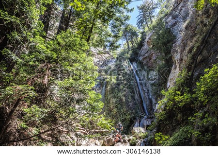 Hiking to the water falls, & enjoying the coastal redwood trees & forest trails, close to the Big Sur Highway (California State Highway 1), on California Central Coast, near Limeklin State Park.