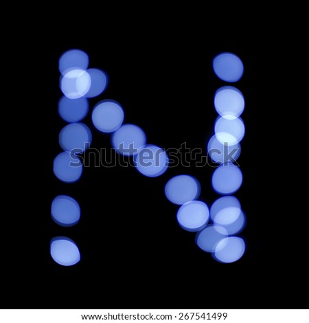 letter of Christmas lights on a dark background, the letter N, \