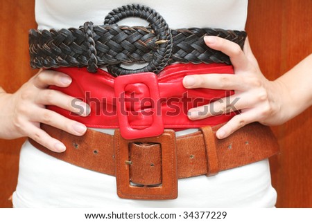 Belts around the waist (can be used for fashion or health concepts)
