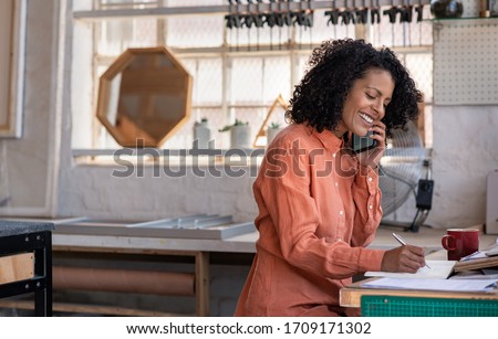 Similar – Image, Stock Photo Female artisan with frame standing in art workshop