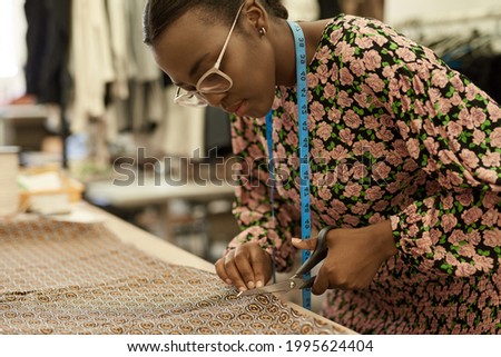 Similar – Image, Stock Photo Female artisan working with paints in workshop