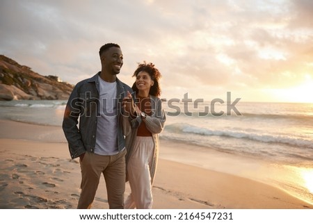 Similar – Image, Stock Photo Couple is walking along the ocean